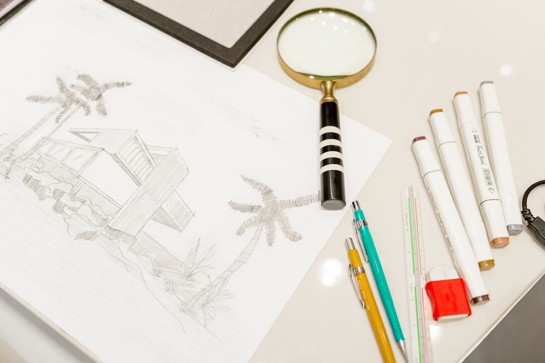 Desk with hand-drawn storyboard sketches and pencils for a TV commercial